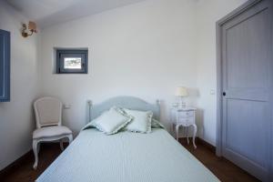 Postel nebo postele na pokoji v ubytování Podere La Contessa B&B