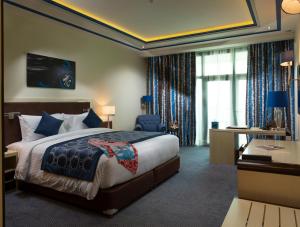 Katil atau katil-katil dalam bilik di Retaj Salwa Resort & Spa