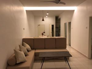 a living room with a couch and a sink at Brand New Apartment in Local Neighbourhood in Ringlet