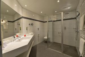 Koupelna v ubytování Aribo Hotel