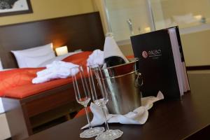 Postel nebo postele na pokoji v ubytování Aribo Hotel