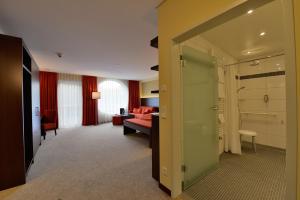 Koupelna v ubytování Aribo Hotel