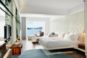 A television and/or entertainment centre at Nikki Beach Resort & Spa Porto Heli