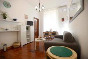 TV a/nebo společenská místnost v ubytování MECENATE DELUXE COLOSSEUM