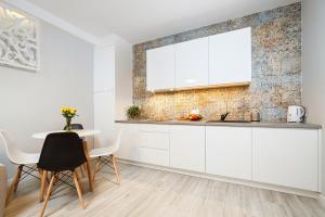 Cuisine ou kitchenette dans l'établissement Apartment Sarego