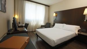 Posteľ alebo postele v izbe v ubytovaní Max Hotel Livorno
