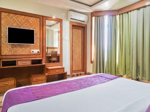 Giường trong phòng chung tại Pemaling Lords Eco Inn Guwahati