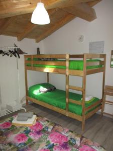 a room with two bunk beds in a room at Palazzo Ruisi in Scordia