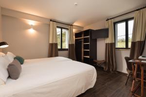 Voodi või voodid majutusasutuse Hotel Rural Sagarlore toas