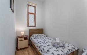 Postel nebo postele na pokoji v ubytování E-M Apartments with Private pool