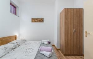 Postel nebo postele na pokoji v ubytování E-M Apartments with Private pool