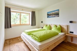 Postel nebo postele na pokoji v ubytování Frühaufhof