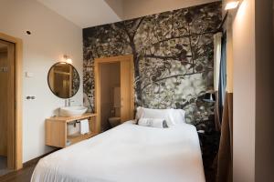 Voodi või voodid majutusasutuse Hotel Rural Sagarlore toas