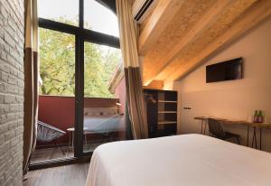 Voodi või voodid majutusasutuse Hotel Rural Sagarlore toas