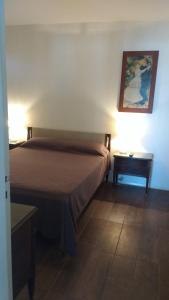 Postel nebo postele na pokoji v ubytování Apart frente al mar piso 32 cochera