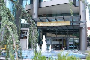 a fountain in front of a metroure hotel at Mercure Tetovo in Tetovo