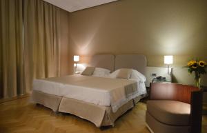 Кровать или кровати в номере Palazzo Esedra
