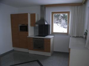 Η κουζίνα ή μικρή κουζίνα στο Apartment-Bergblick