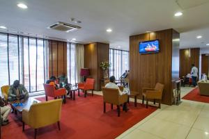 TV a/nebo společenská místnost v ubytování Skyna Hotel Luanda
