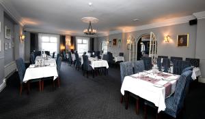 Un restaurant u otro lugar para comer en Leenane Hotel