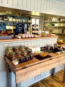 a counter in a kitchen with food on it at The Beach House in West Wittering