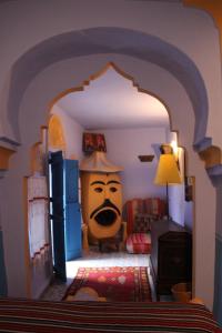 Postel nebo postele na pokoji v ubytování Hôtel Dar Terrae