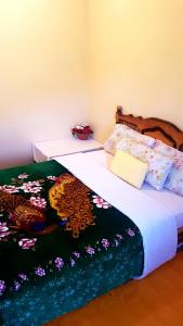 Ліжко або ліжка в номері Auberge Kasbah Ait Marghad