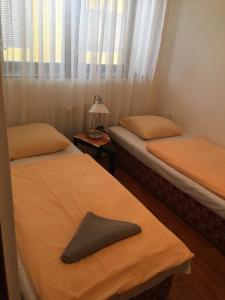 Postel nebo postele na pokoji v ubytování Holiday Park Vrchlabí - Liščí farma