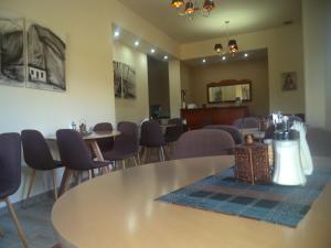Area soggiorno di Ενοικιαζόμενα Δωμάτια Ενιπεύς- Rooms Enipeas