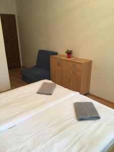 Postel nebo postele na pokoji v ubytování Holiday Park Vrchlabí - Liščí farma