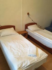 Postel nebo postele na pokoji v ubytování Holiday Park Vrchlabí - Liščí farma