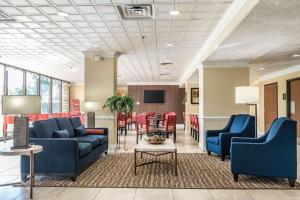a lobby with couches and chairs and a table at Comfort Inn Cranberry Twp in Cranberry Township