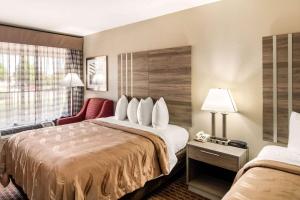 Postel nebo postele na pokoji v ubytování Quality Inn Paris Texas