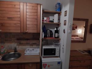 
Kuchyňa alebo kuchynka v ubytovaní Apartmán Malino Brdo - Hrabovská dolina
