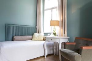 Posteľ alebo postele v izbe v ubytovaní Das REGINA Boutiquehotel