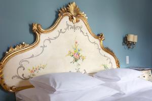 Posteľ alebo postele v izbe v ubytovaní Das REGINA Boutiquehotel