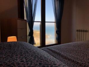 Łóżko lub łóżka w pokoju w obiekcie Costa Da Morte Deluxe