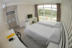 Postel nebo postele na pokoji v ubytování HOTEL HPR