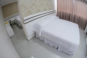 Postel nebo postele na pokoji v ubytování HOTEL HPR