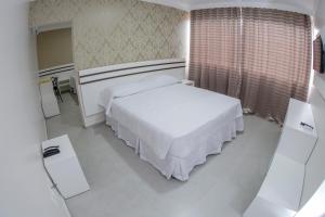 Postel nebo postele na pokoji v ubytování HOTEL HPR