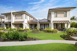 an image of a house with a yard at Beach View Hotel in Saint James