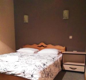 Postel nebo postele na pokoji v ubytování Guest House Pid Dubom