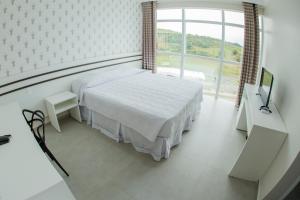 Postel nebo postele na pokoji v ubytování HOTEL HPR