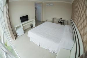 Postel nebo postele na pokoji v ubytování HOTEL HPR