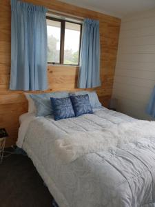 Llit o llits en una habitació de Bealey street Guesthouse