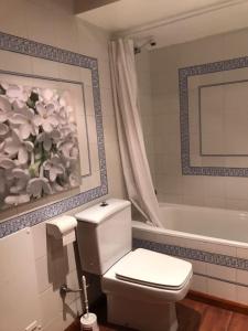 Ett badrum på Apartamentos Tanau