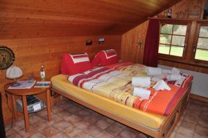 Postel nebo postele na pokoji v ubytování Chalet Allmegrat
