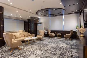 Posezení v ubytování Dior Inn Apartment Hotel
