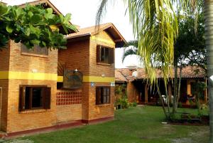 Zahrada ubytování Pousada e Residencial Canto Verde...a uma quadra da melhor praia...