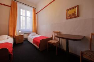 Posteľ alebo postele v izbe v ubytovaní Red Carpet Hostel